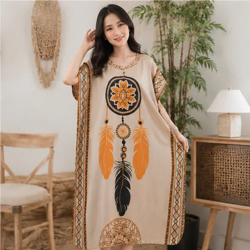 Model memakai daster jumbo warna Kuning